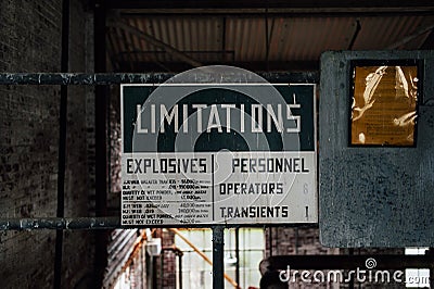 Vintage Limitations Sign - Debagging Building - Abandoned Indiana Army Ammunition Depot - Indiana Stock Photo