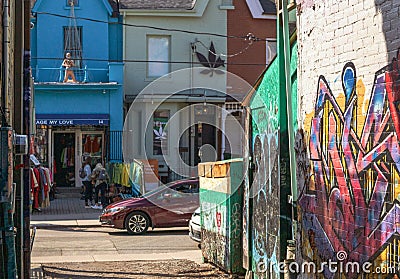 View on vintage clothing stores from the back streets of Kensington Market Editorial Stock Photo