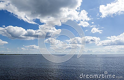 View of river, sky with clouds, horizon Stock Photo