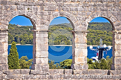 View through walls and arches of Arena Pula, Roman amphitheater in Istria Stock Photo