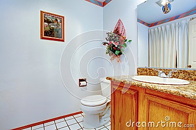 VIew of washbasin cabinet and toilet Stock Photo