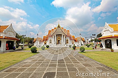 View of Wat Benchamabophit or The Marble Temple in Bangkok City Thailand, with its bright decorated golden roofs Stock Photo