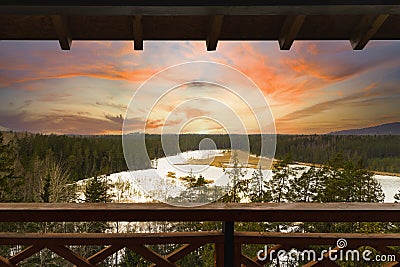 View from watchtower in a park, white beautiful sunset and frozen lake Stock Photo