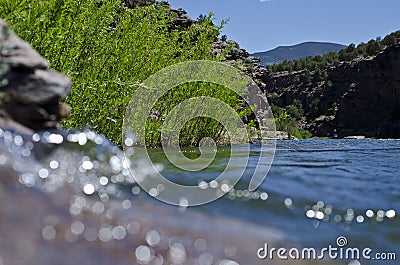 The green river rock bank Stock Photo