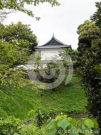 View of the white tower of former Edo castle across Ushigafuchi moat Stock Photo