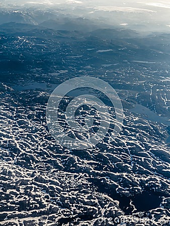 View from window of airplane flying over Norway Scandinavia. Stock Photo