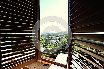 View from window with blinds of house in Nocera Umbra, town and comune in the province of Perugia, Italy Stock Photo