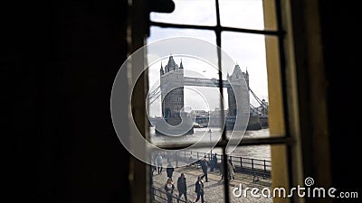 View from window of British bridge. Action. Inside apartment there is beautiful view from window of tower bridge with Stock Photo
