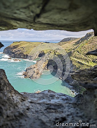 The view from a window at Tintagel Castle in Cornwall, England, from the mainland. Stock Photo