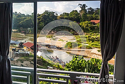 View from window to the Tembeling river in Kuala Tahan village, Taman Negara national park, Malays Stock Photo