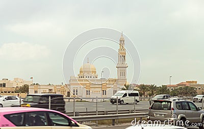 View from the window of a tourist bus on Mohammad Khamis Bin Hendi Almeheiri Masjid mosque of the Dubai city, United Arab Emirates Editorial Stock Photo