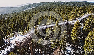 View of wooden bridge treetop Pohorje observation deck in winter Stock Photo