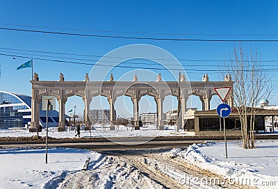 View from the yard to the decorative building on Nazarbayev Square, exit from the yard to the street Editorial Stock Photo