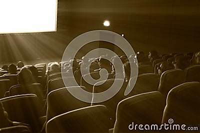 Viewers watch 3D movie, sepia toning Editorial Stock Photo