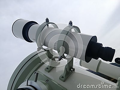 Viewfinder of telescope, viewfinder of refracting device instrument for land lunar or planetary observation of distant object, mag Stock Photo