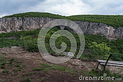 Viewpoint `The bench of Love` on edge of canyon Dryanovo river near.Monastery St. Archangel Michael, Gabrovo region, Bulgaria Stock Photo
