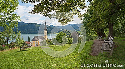 viewpoint with bench, Weinberg hill Schliersee with St. Sixtus church and bavarian alps Stock Photo