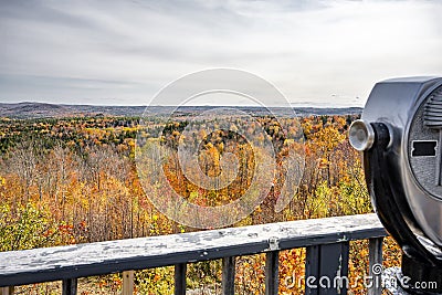 Viewpoint with Coin Binoculars with a Fabulous Landscape with Colorful Hills Covered with Autumn Maples in Vermont New England Stock Photo