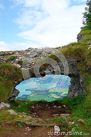 Viewpoint through the window of Bleckwand fenster from the mountains above the Wolfgangsee in Austria near to Salzburg Stock Photo