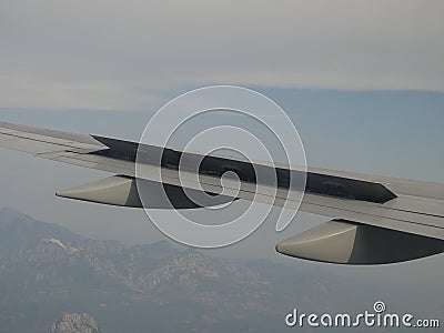 Views from the airplane.Spoilers.Mechanization of the wing of the aircraft. Stock Photo