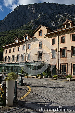 Views of the facade of the main building. Vertical image of the Balneario de La Hermida Editorial Stock Photo
