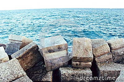 Views of the Fuengirola dike in the harbor at sunset Stock Photo