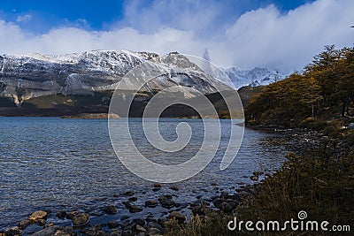 Views of a lake with the bottom of a mountain Stock Photo