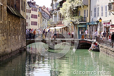 Annecy, France. Views of the crowded town and bridges. Editorial Stock Photo