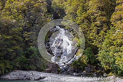 Views of New Zealand. Waterfall among the greenery. South Island Stock Photo
