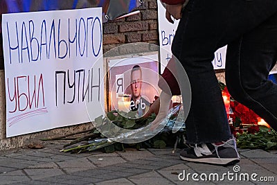 Vigil for Navalny in front of Russian Embassy in Madrid. Protest in memory of Navalny. Editorial Stock Photo