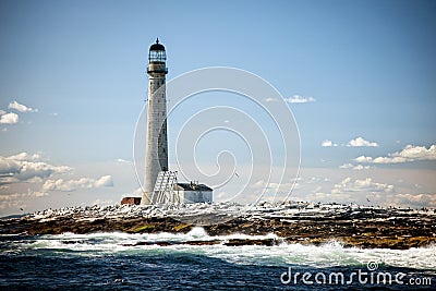 Vignette of Tallest Lighthouse in New England at Low Tide on Sum Stock Photo