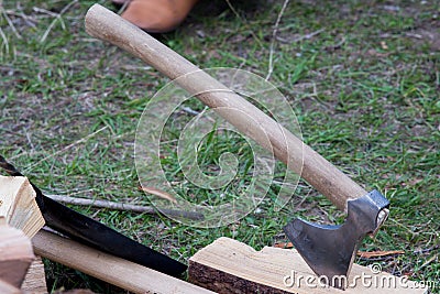Viking battle ax stuck into a piece Stock Photo