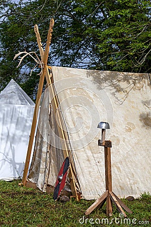 Viking shield leaning against a tent Stock Photo