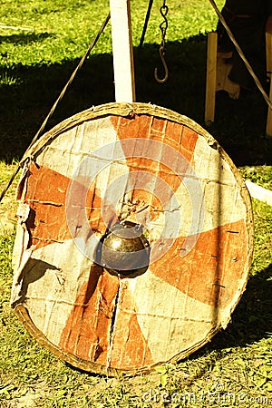 Viking shield at the military tent camp at the historical reconstruction festival Stock Photo