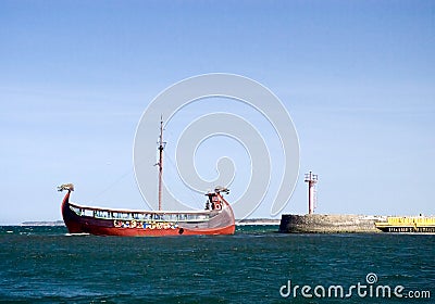 Viking ship leaving port Stock Photo