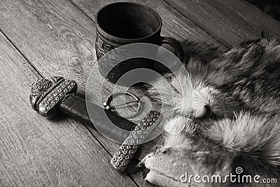 Viking sword and stein on a fur Stock Photo