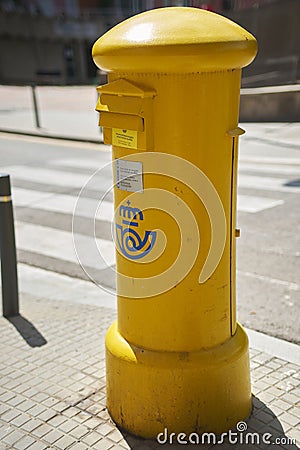 Viladecans, Spain - September 14, 2023: Yellow mailbox for sending postal letters of the Spanish. Editorial Stock Photo