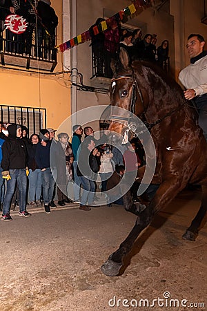 Vilanova d`Alcolea, CastellÃ³n, Spain - January 19, 2019: Horse race without saddle through the streets of the village in a Editorial Stock Photo