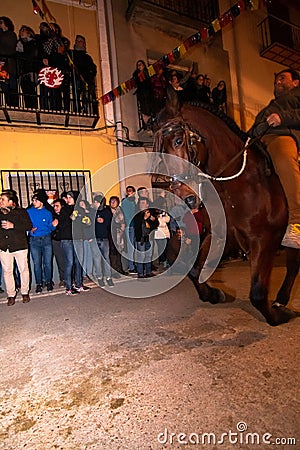 Vilanova d`Alcolea, CastellÃ³n, Spain - January 19, 2019: Horse race without saddle through the streets of the village in a Editorial Stock Photo