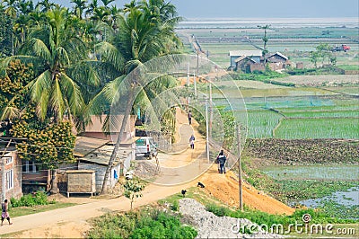 Village in Assam India near rice fields Editorial Stock Photo