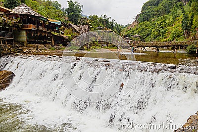 The village Cat Cat in Sapa, Vietnam. Large waterfall in the rainy season Editorial Stock Photo