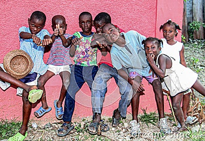 Village children in rural Haiti love to pose for the camera. Editorial Stock Photo