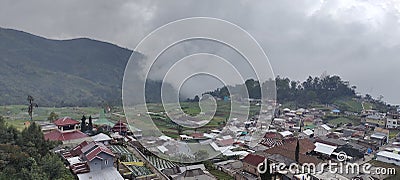 village in the highlands covered in cloud Stock Photo