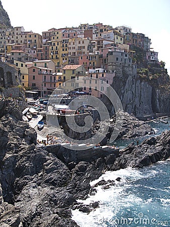 Village of Manarola on cliffs above Ligurian Sea Stock Photo