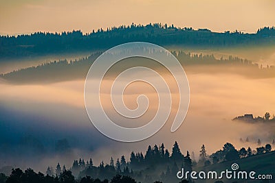 Village in the mist Stock Photo