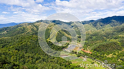 Village and rice fields in Cordillera mountains, Philippines. Beautiful landscape on the island of Luzon. Mountains and fields, Stock Photo