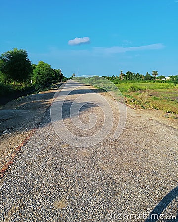 Village road fields aside Stock Photo