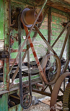 The old threshing machine from Sarbi village, Budesti commune, Maramures county, Romania. Stock Photo