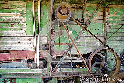 The old threshing machine from Sarbi village, Budesti commune, Maramures county, Romania. Stock Photo