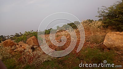 Village side soil coloured excavated rocks Stock Photo